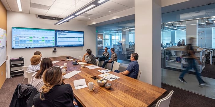 Team at WRNS Studio in San Francisco having a meeting using the Nureva HDL300 audio conferencing system