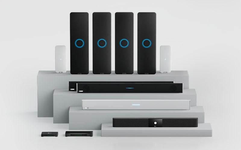 The full Nureva audio product lineup is shown on a tiered display, including the HDX full-featured audio series and the HDL audio conferencing series. All are designed to enhance collaboration and communication in meeting rooms, training rooms and other hybrid work environments.