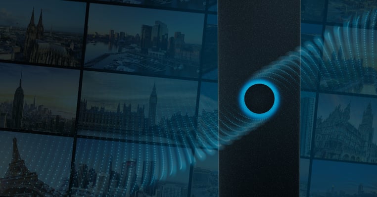 Close-up of an HDX audio bar with a glowing blue light, emitting stylized sound waves, across a grid of cityscapes, representing the upcoming HDX on Tour event.