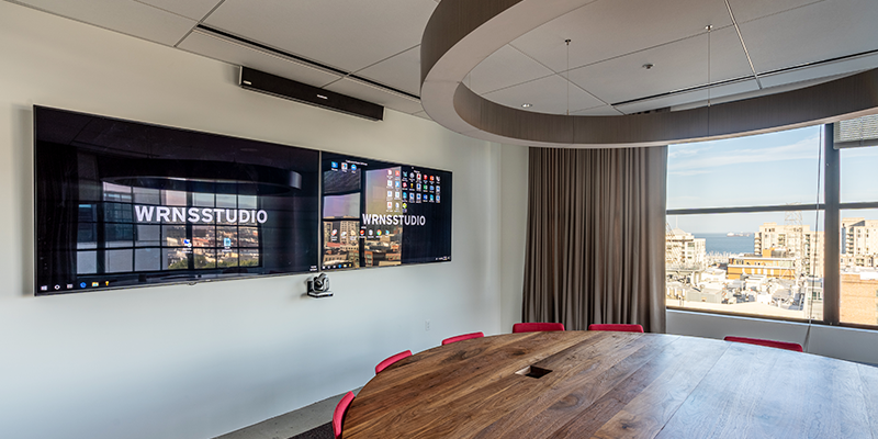 Meeting room at WRNS Studio featuring the Nureva HDL300 audio conferencing system