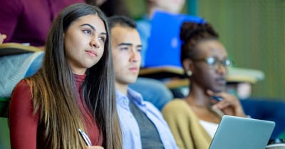 Students attend class in a HyFlex classroom