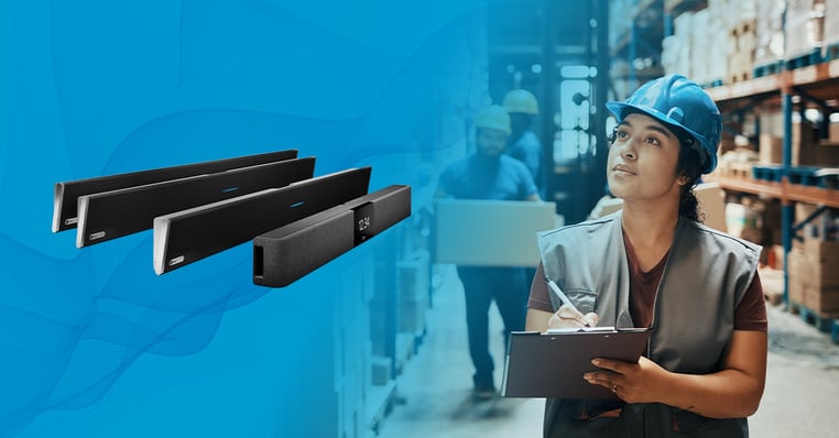 Nureva audio systems next to a worker in a warehouse