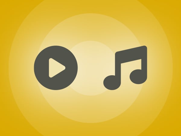 Yellow graphic with play and music icons showing Nureva HDX audio system optimized for media when mics are inactive.