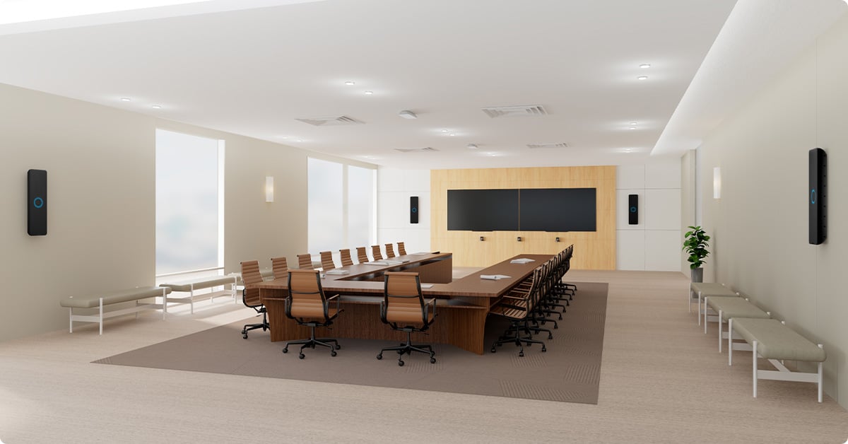 Executive meeting room with Nureva HDX in 4-bar, 2-pod setup for full-room mic coverage around a large table.