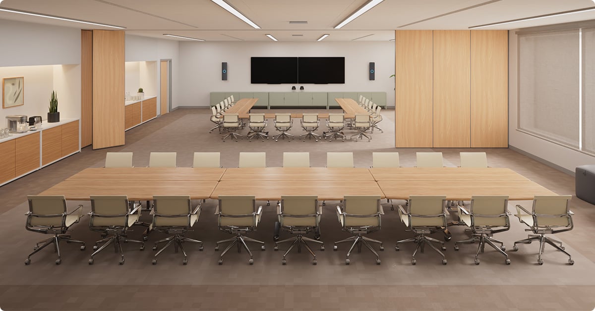 Divisible room with two large tables, multiple chairs, dual displays and Nureva HDX in 2-bar, 1-pod setup for full-room microphone coverage and flexible space design.