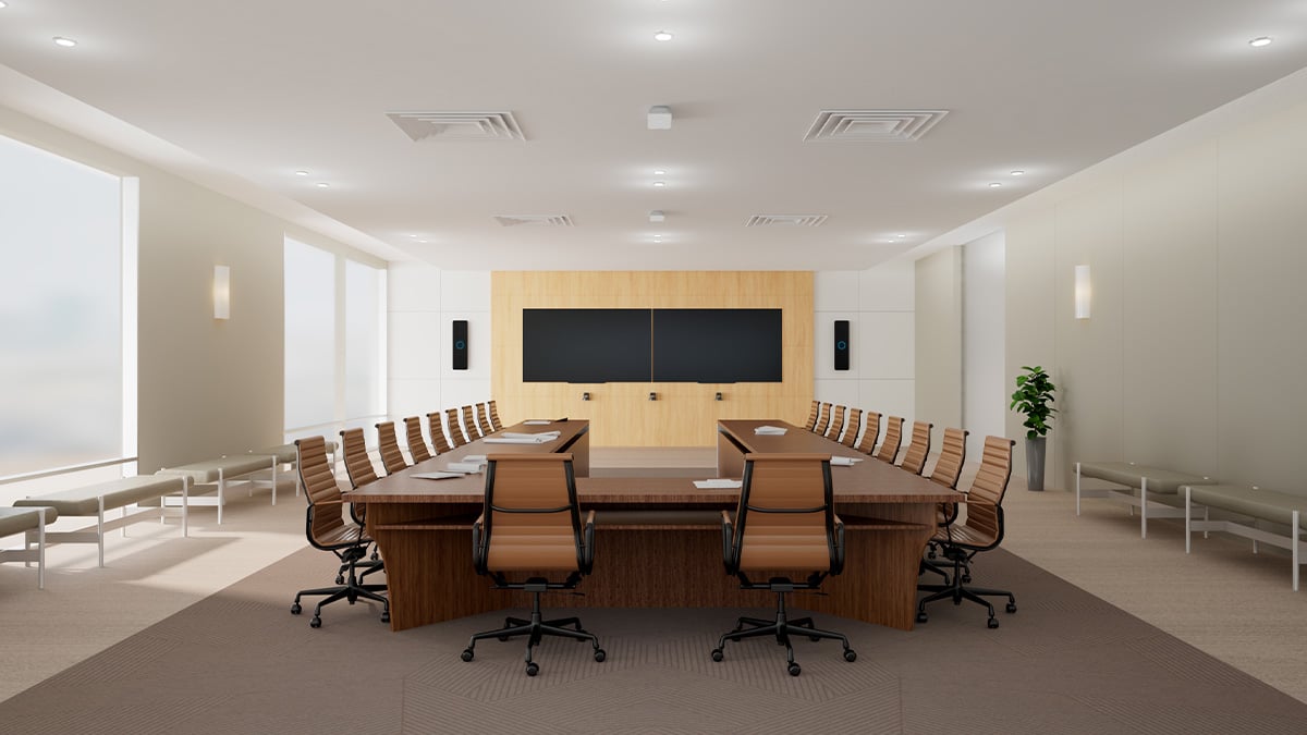 Executive meeting room with Nureva HDX in 4-bar, 2-pod setup for full-room mic coverage around a large table.
