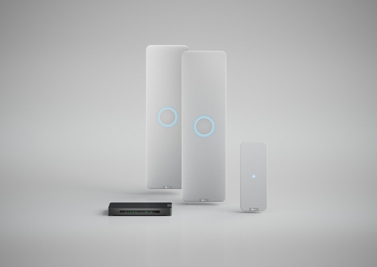 Nureva HDX system with two white audio bars, white microphone pod and a system hub for large meeting spaces.