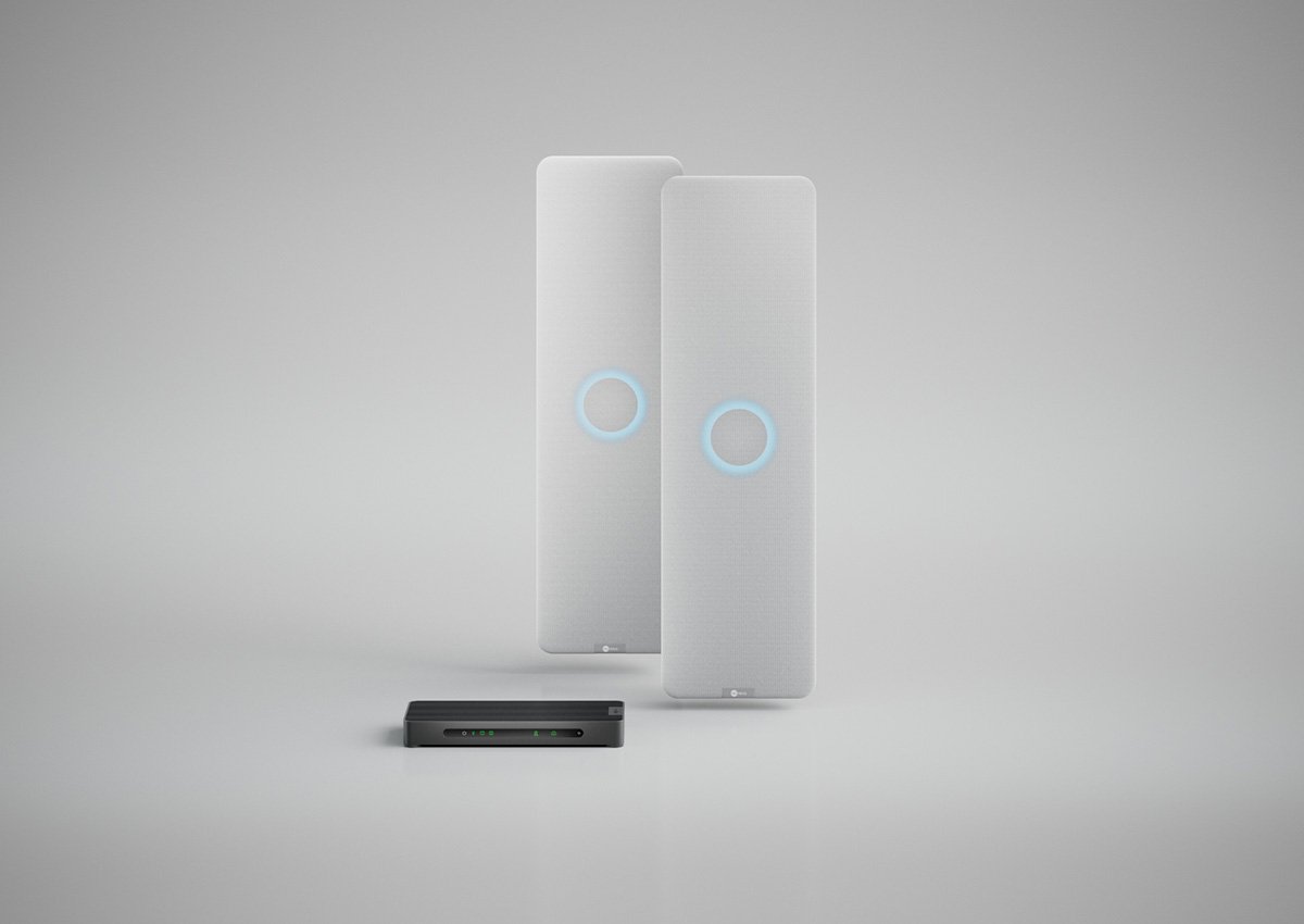 Nureva HDX system with two white audio bars and a system hub for large meeting spaces.