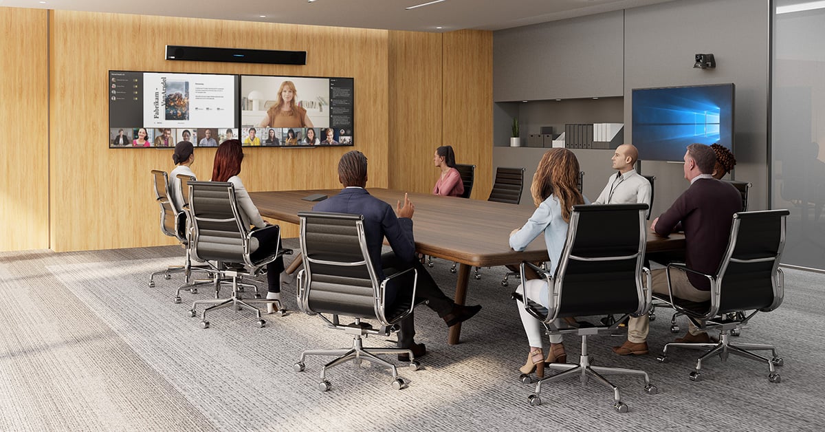 Team collaborating using Nureva HDL310 audio conference system for remote participants