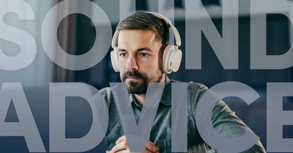 Man wearing over-ear headphones listens intently at a desk behind large overlaid text reading “Sound Advice.”
