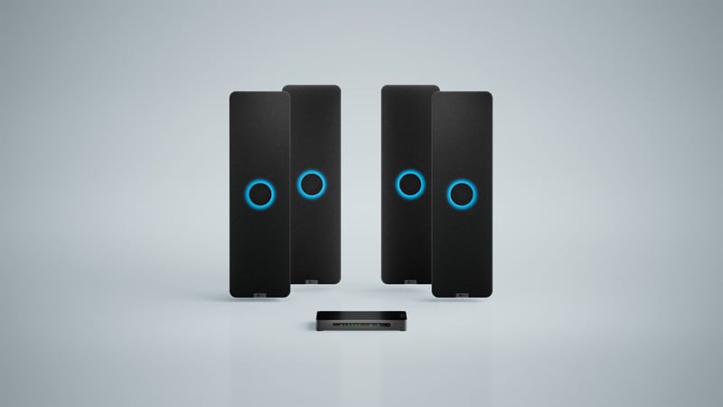 Nureva HDX system with four black audio bars and a system hub for large meeting spaces.