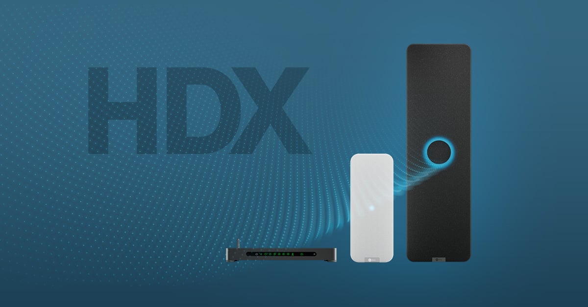 Nureva HDX series showing processor and wall‑mounted speaker with HDX text on a blue background.