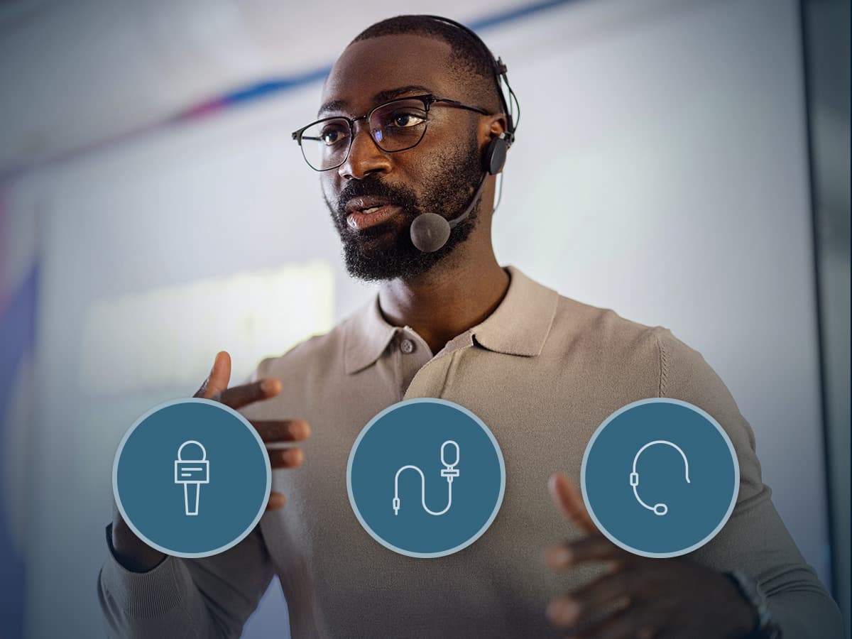 Presenter wearing a headset microphone beside handheld, lavalier and headset icons, illustrating Adaptive Voice Amplification in the Nureva HDX series.