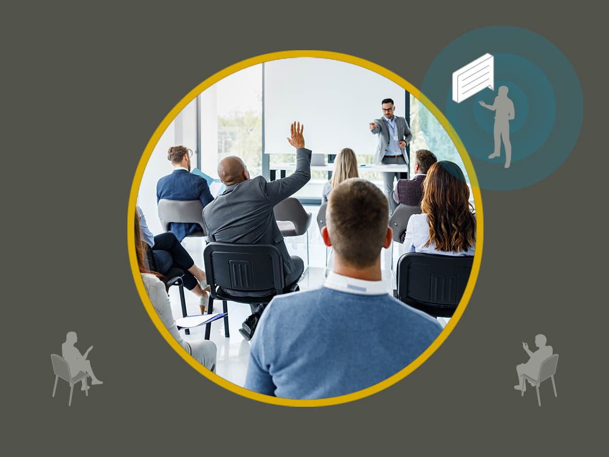 Audience member raising a hand during a presentation, with graphics illustrating Nureva HDX series Adaptive Voice Lift.