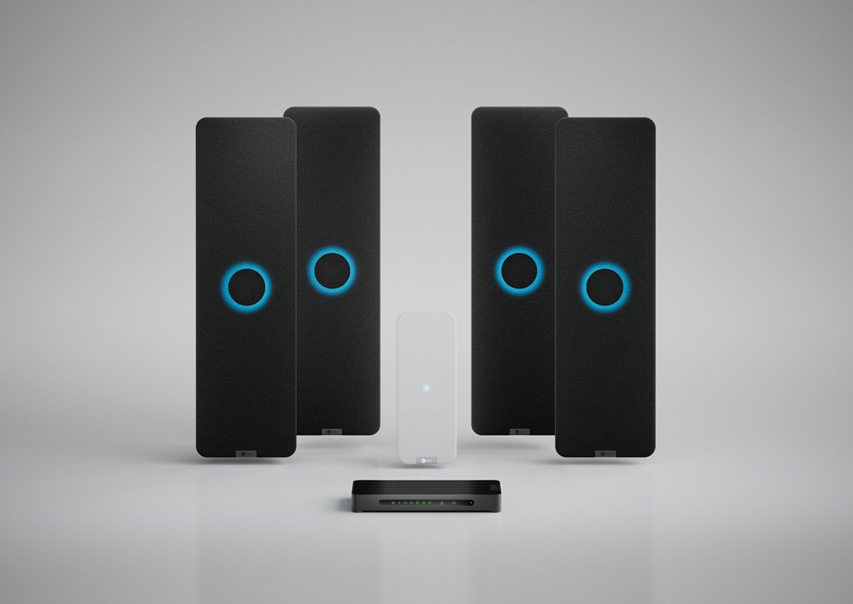 Nureva HDX system with four black audio bars, white microphone pod and a system hub for large meeting spaces.