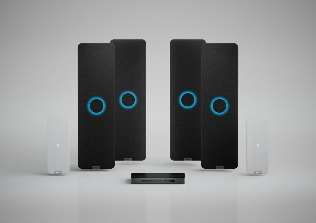 Nureva HDX system with four black audio bars, two white microphone pod and a system hub for large meeting spaces.