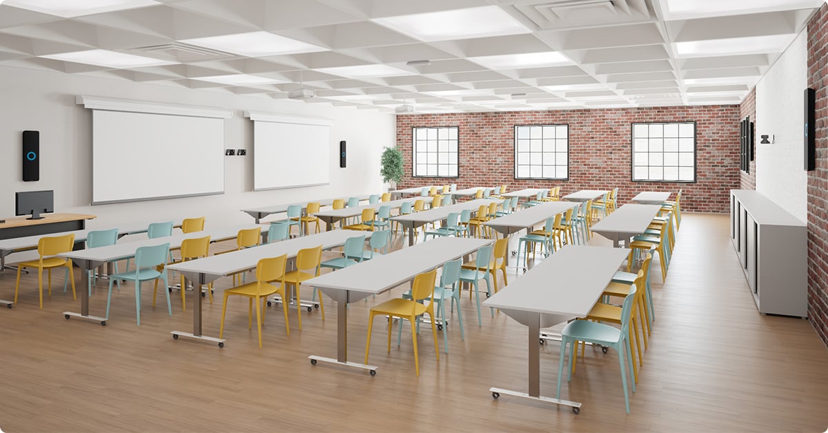 Large classroom with Nureva HDX in 4-bar, 2-pod setup for full-room mic coverage in hybrid learning and lecture capture.