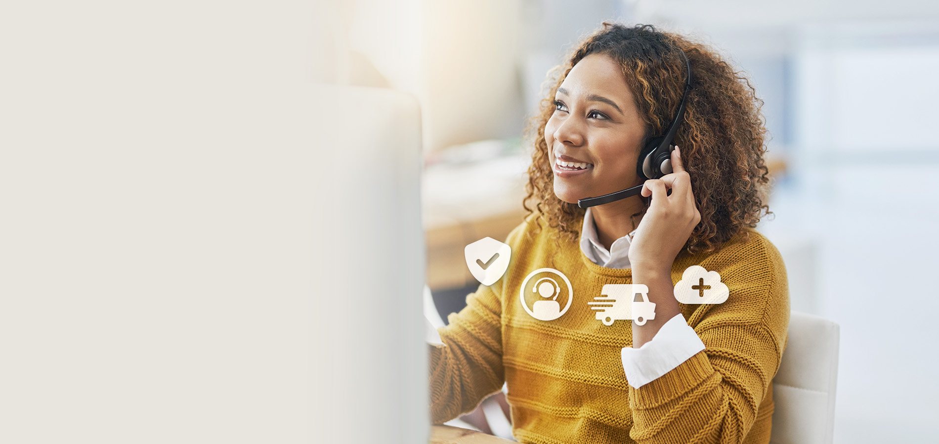 Person using Nureva Pro services in an office environment, with icons representing advanced support, device monitoring, fast replacement and enhanced protection for Nureva audio systems.