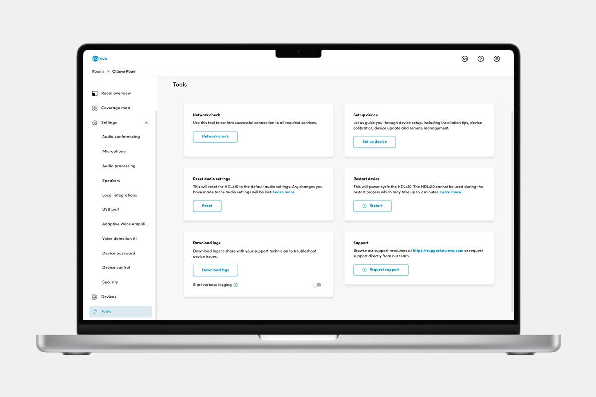 Nureva Console tools page on a laptop with network check, device setup, audio reset, restart and log download options.