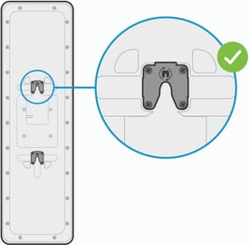 Diagram showing the correct mounting clip orientation (check mark) for installing the Nureva HDX audio bar vertically.