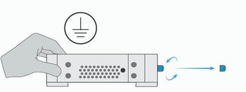 Diagram showing the cap/cover being attached to the Nureva HDX system hub..