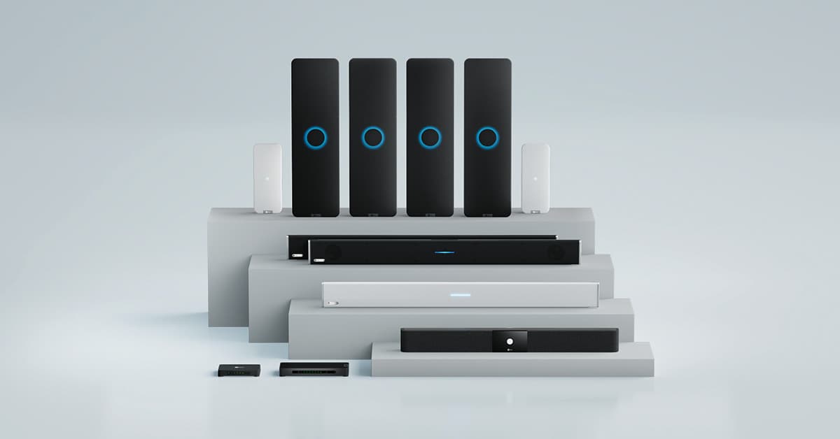 Nureva HDX and HDL product family including multiple microphone and speaker bars with blue circular accents, along with accessories arranged on white display platforms.