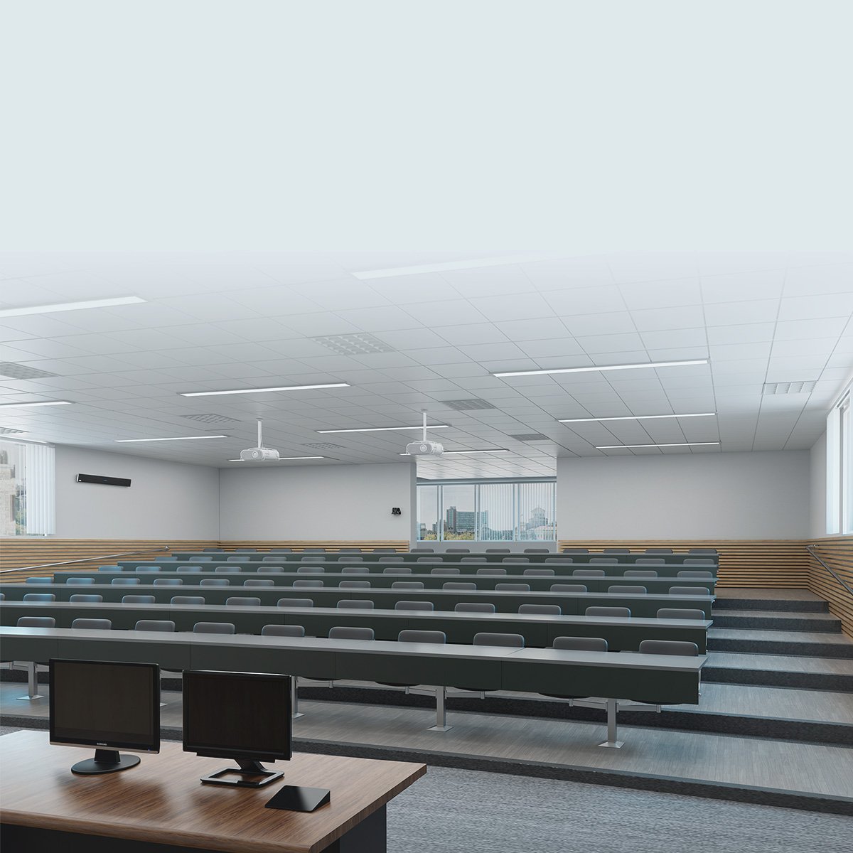 Large university lecture hall with tiered seating and a Nureva HDL audio bar mounted on the wall for full-room coverage.