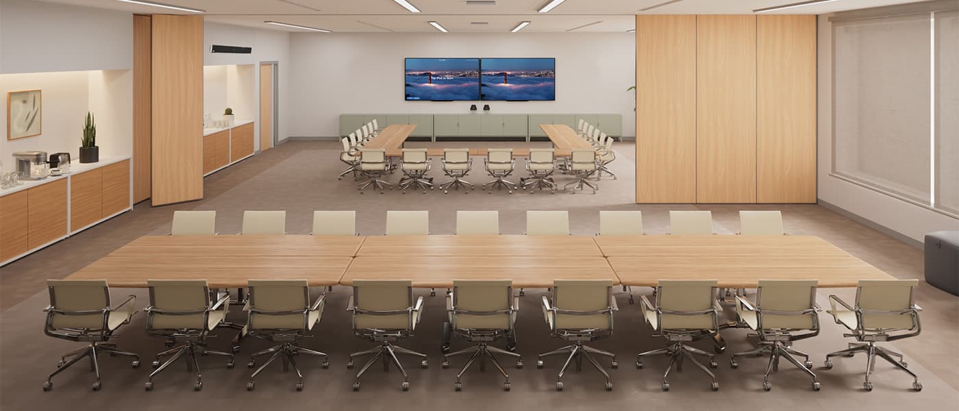 Large divisible meeting room with two separate table configurations and Nureva and Zoom video conferencing, set up for flexible hybrid collaboration.