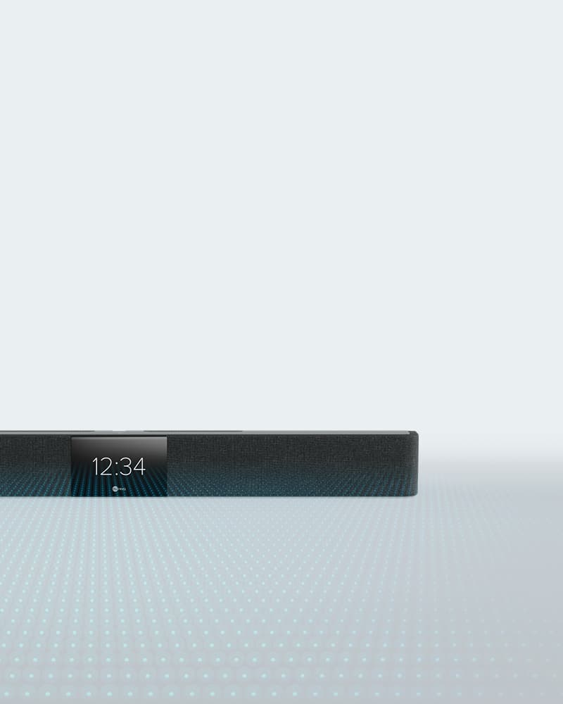 Nureva HDL200 audio conferencing system in dark with an overlay of blue dots representing Microphone Mist technology.