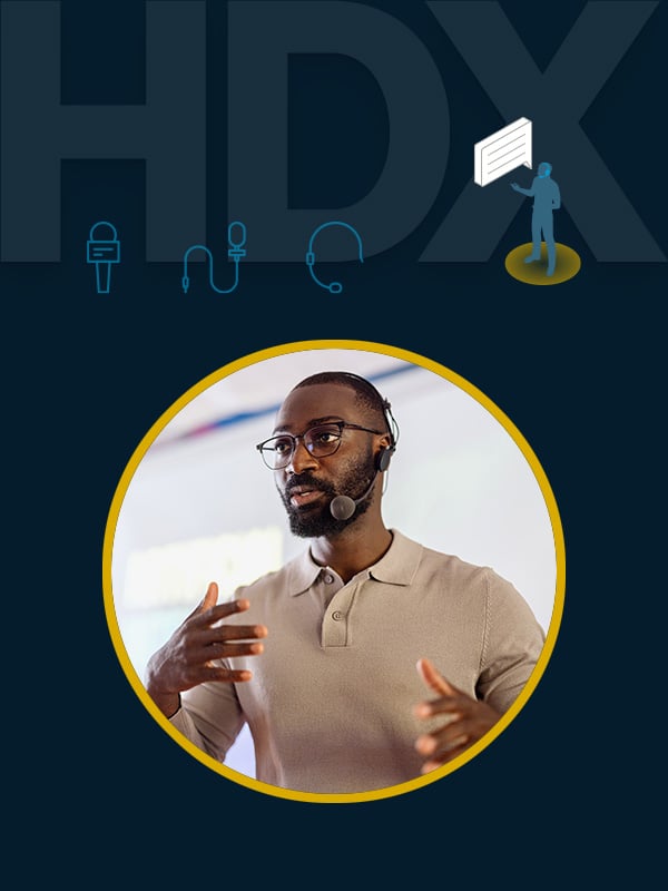 Graphic illustrating Nureva HDX series with Adaptive Voice Amplification feature, showing a person speaking during a presentation, designed to deliver clear and consistent voice levels across large meeting spaces.