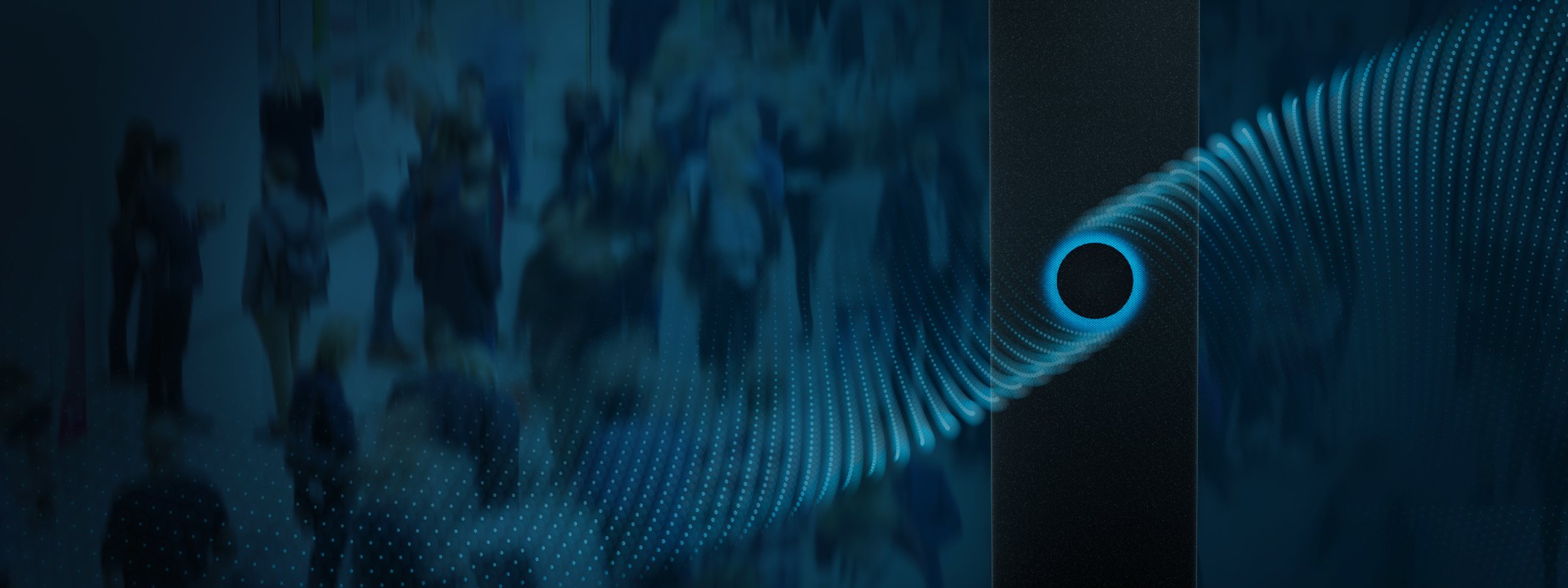 Nureva HDX conferencing microphone array on display at the InfoComm 2026 trade show, with stylized blue sound waves radiating across a busy exhibit hall. HDX launches summer 2026.